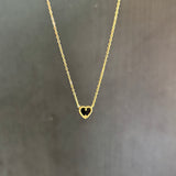 Reversible heart necklace