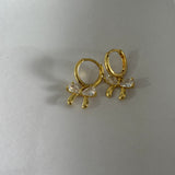 Bow huggie earrings
