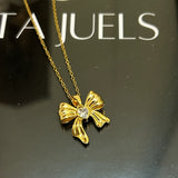 Studded bow necklace