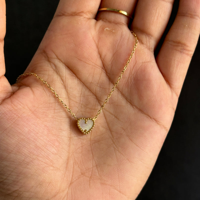Reversible heart necklace
