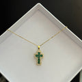 Emerald cross necklace
