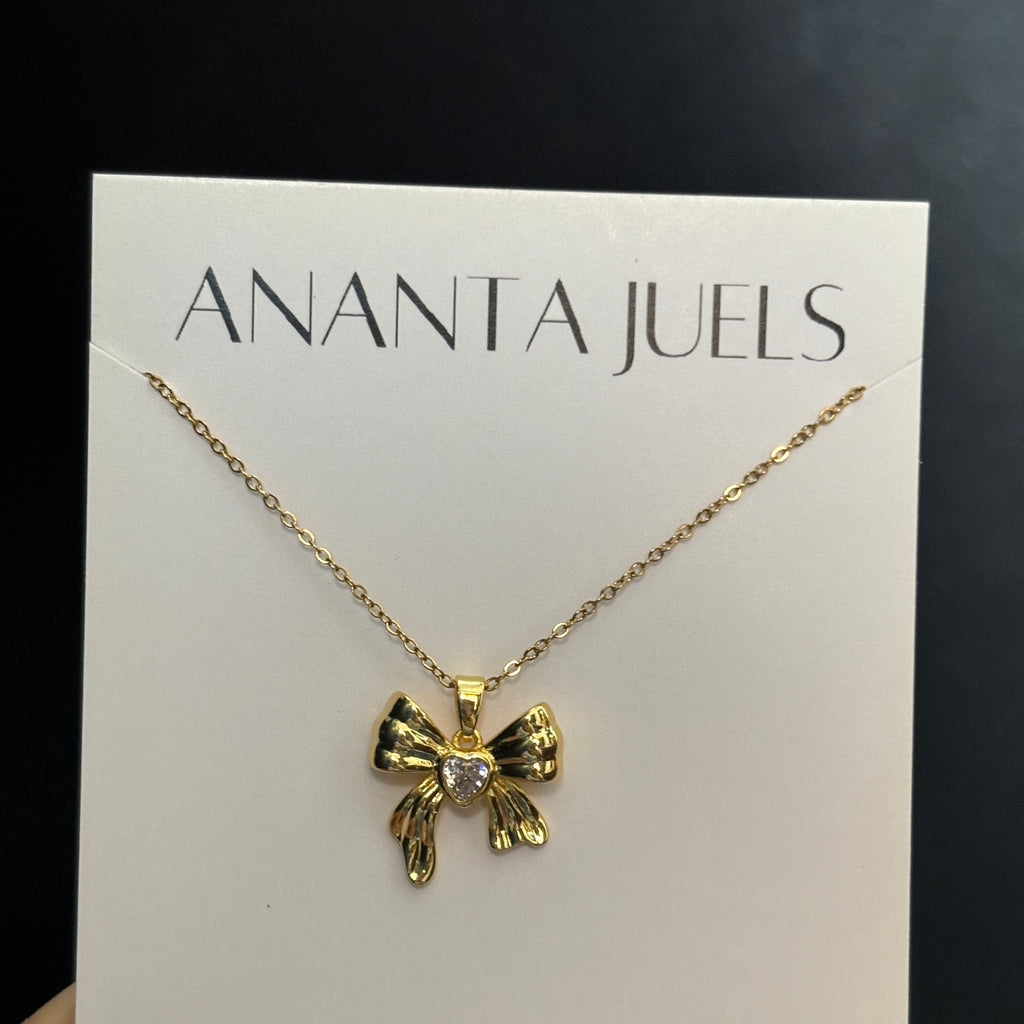 Studded bow necklace