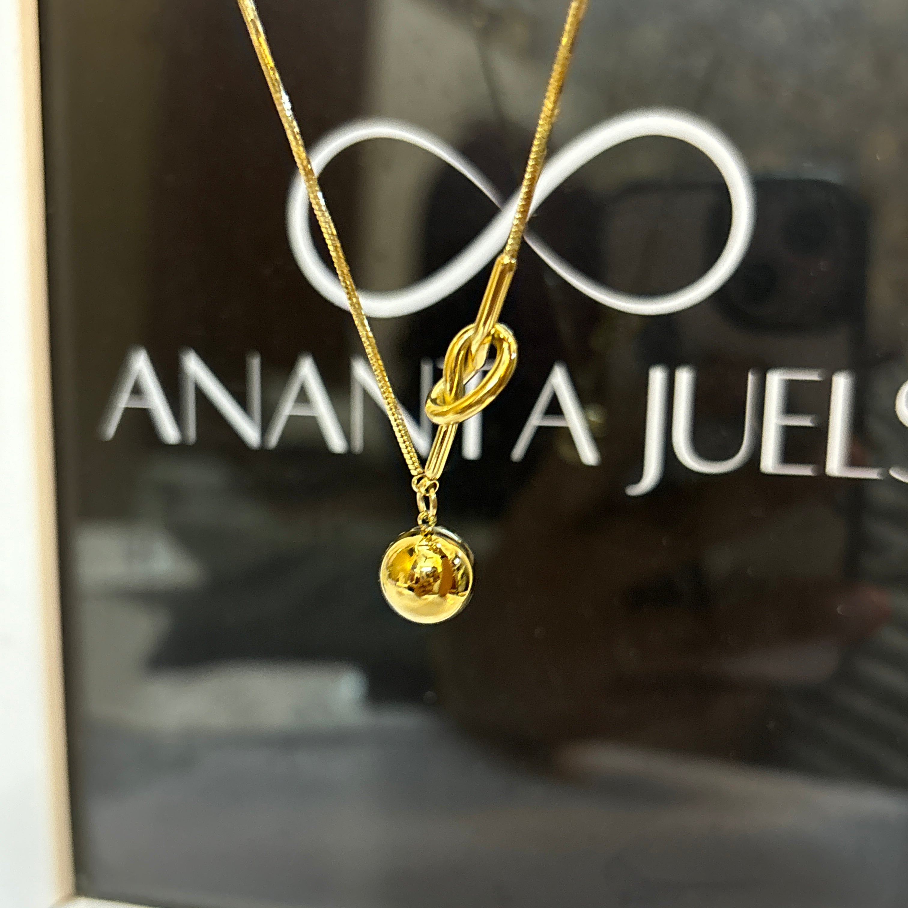 Knot ball necklace