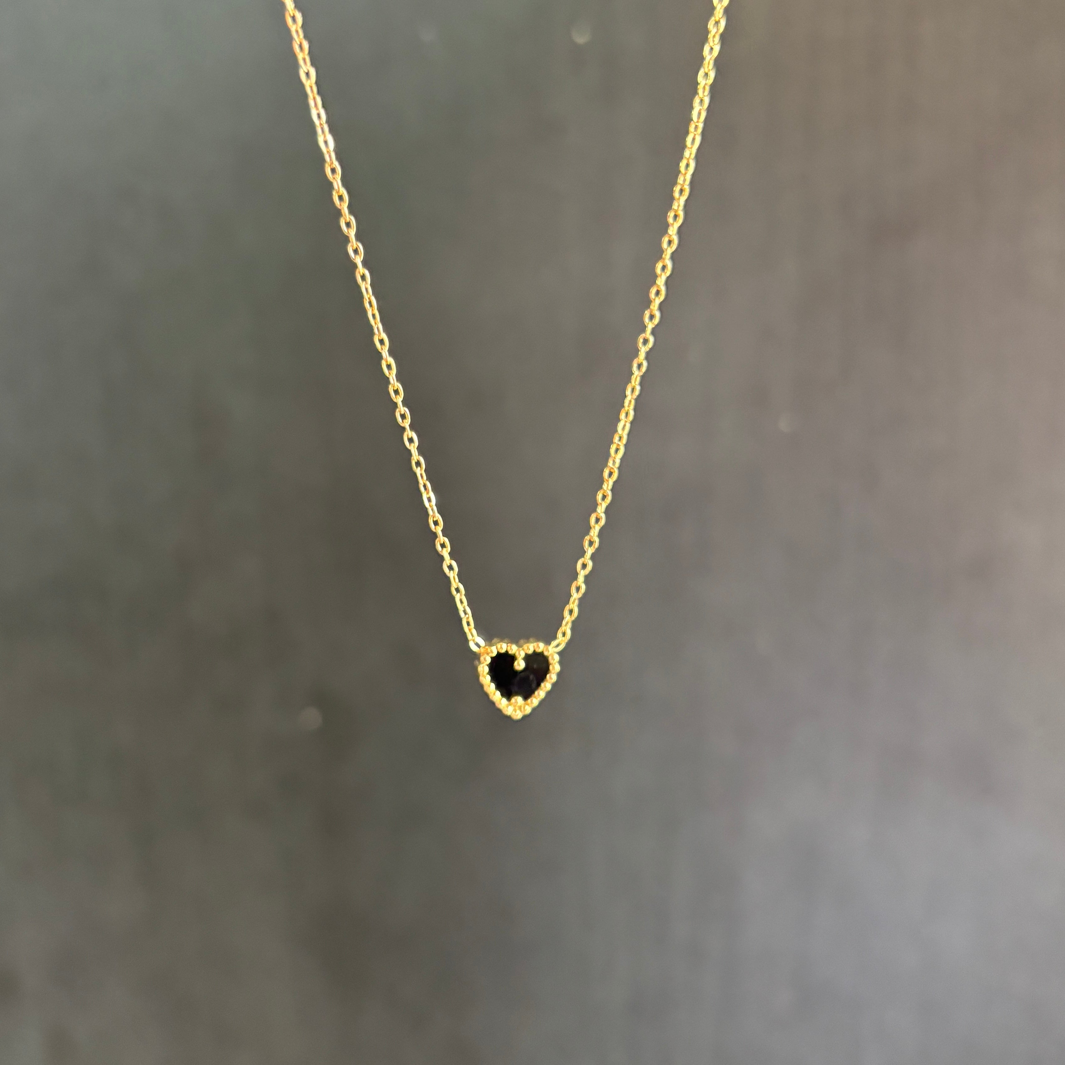 Reversible heart necklace