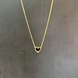 Reversible heart necklace