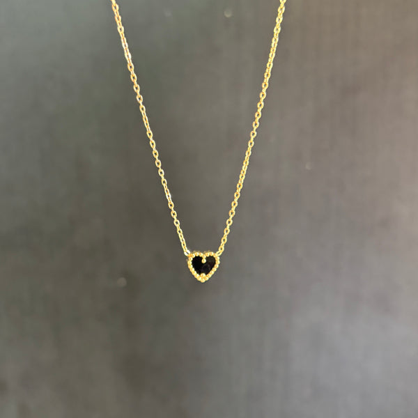 Reversible heart necklace