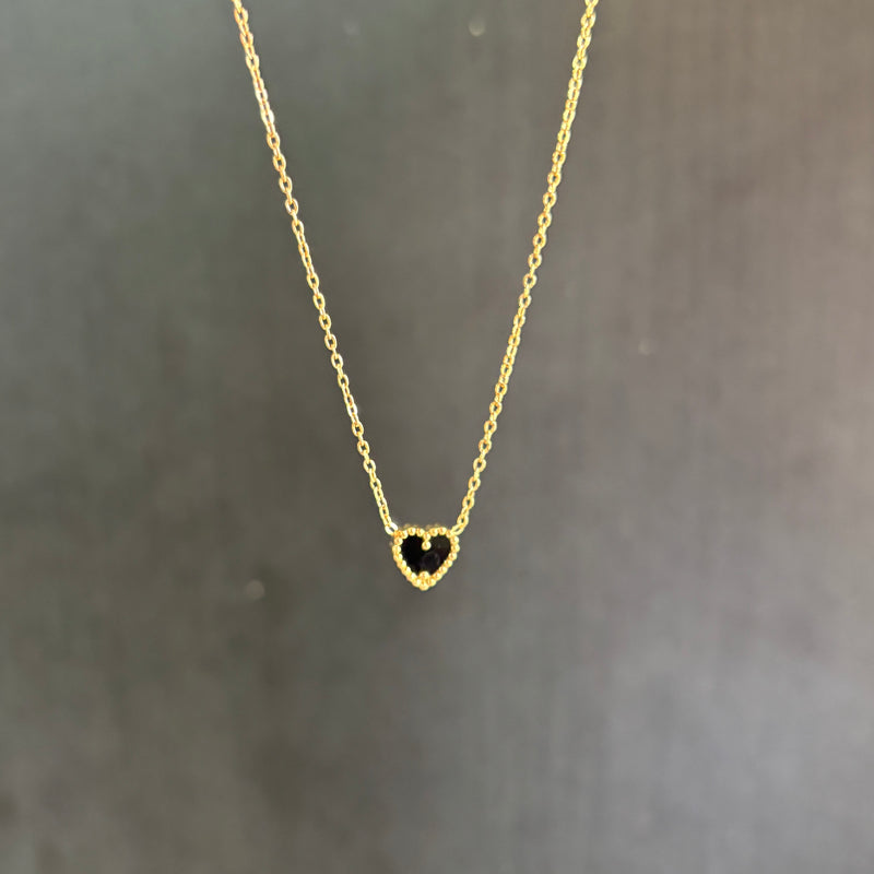 Reversible heart necklace