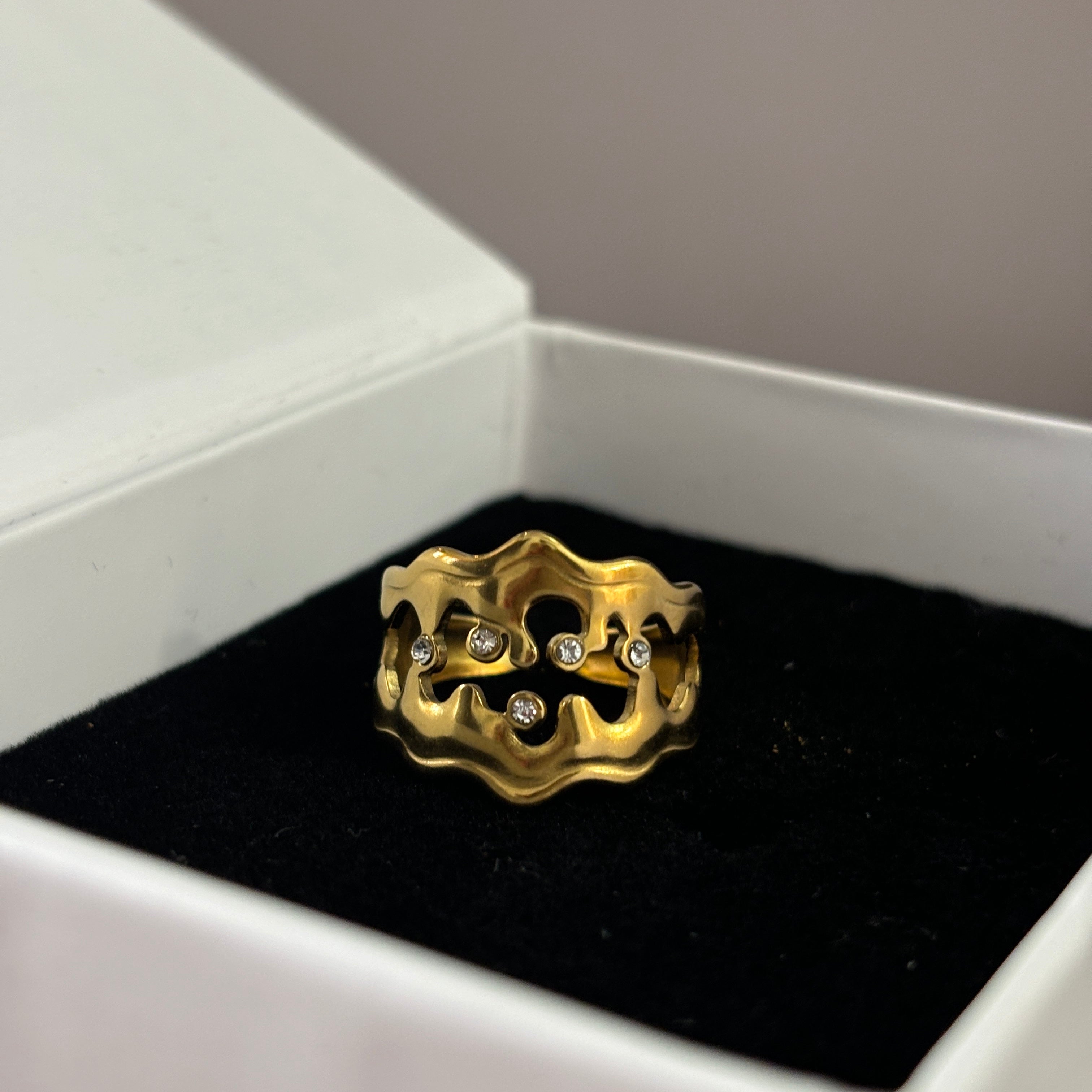 Studded irregular shape ring