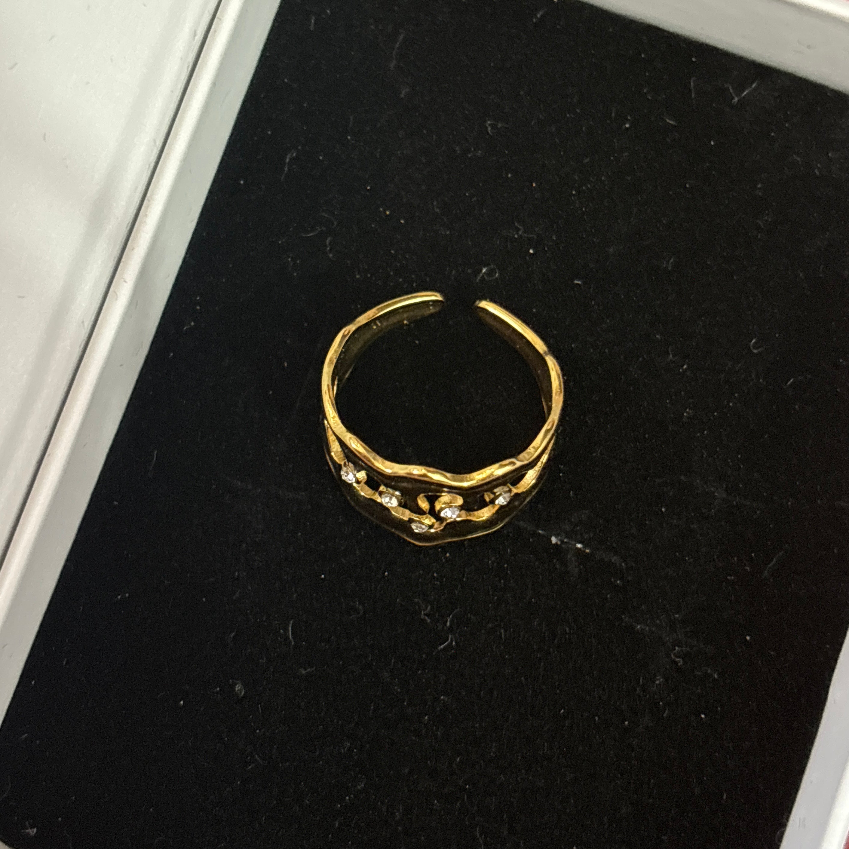 Studded irregular shape ring