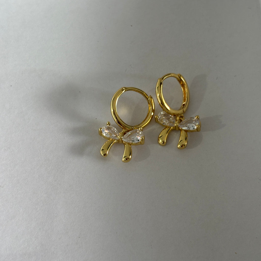 Bow huggie earrings
