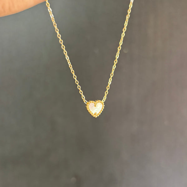 Reversible heart necklace