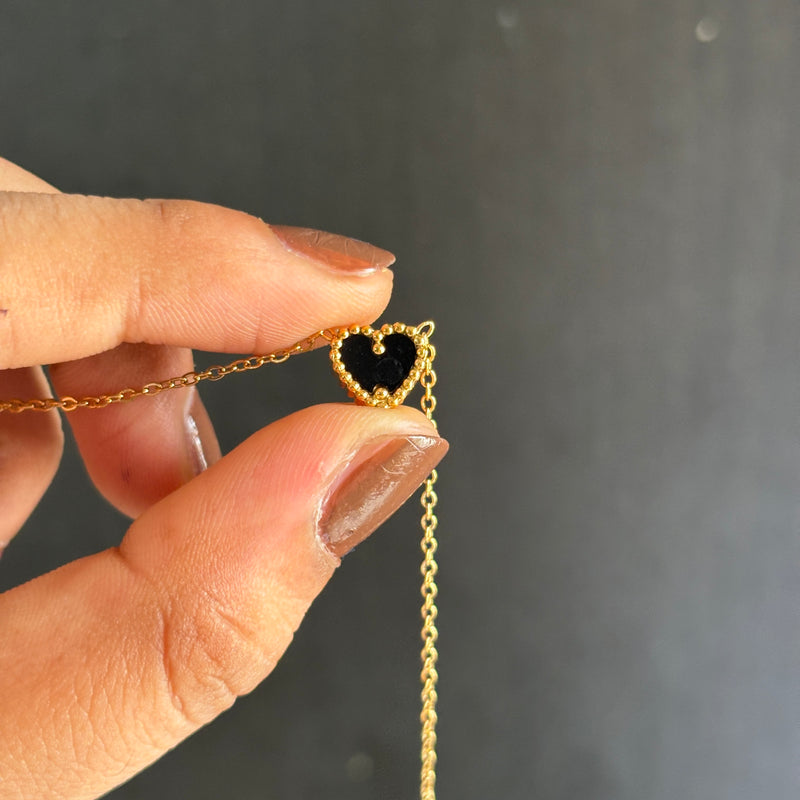 Reversible heart necklace