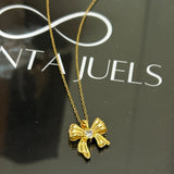 Studded bow necklace
