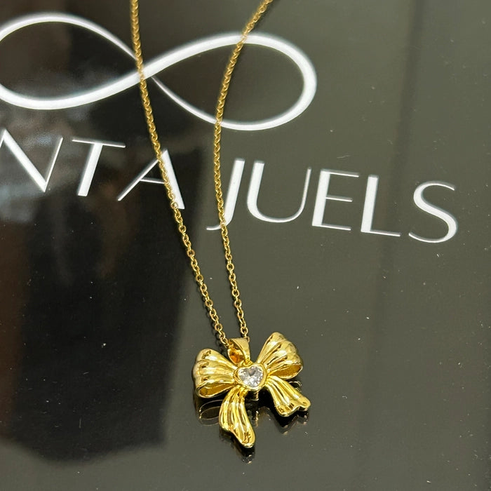 Studded bow necklace