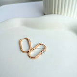 Oval studded hoops