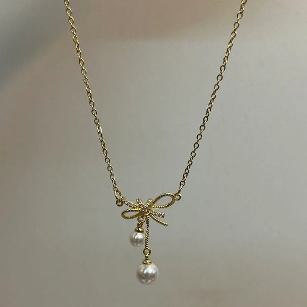 Bow pearl necklace