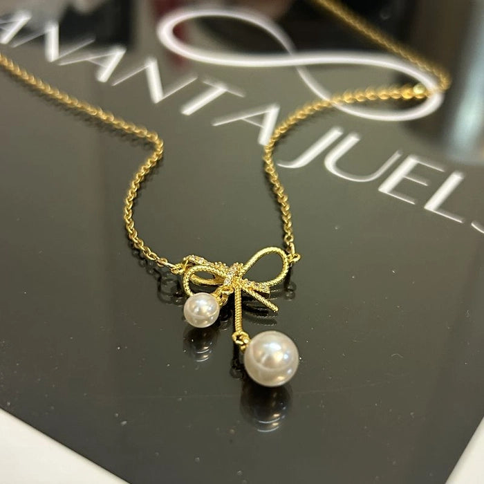 Bow pearl necklace